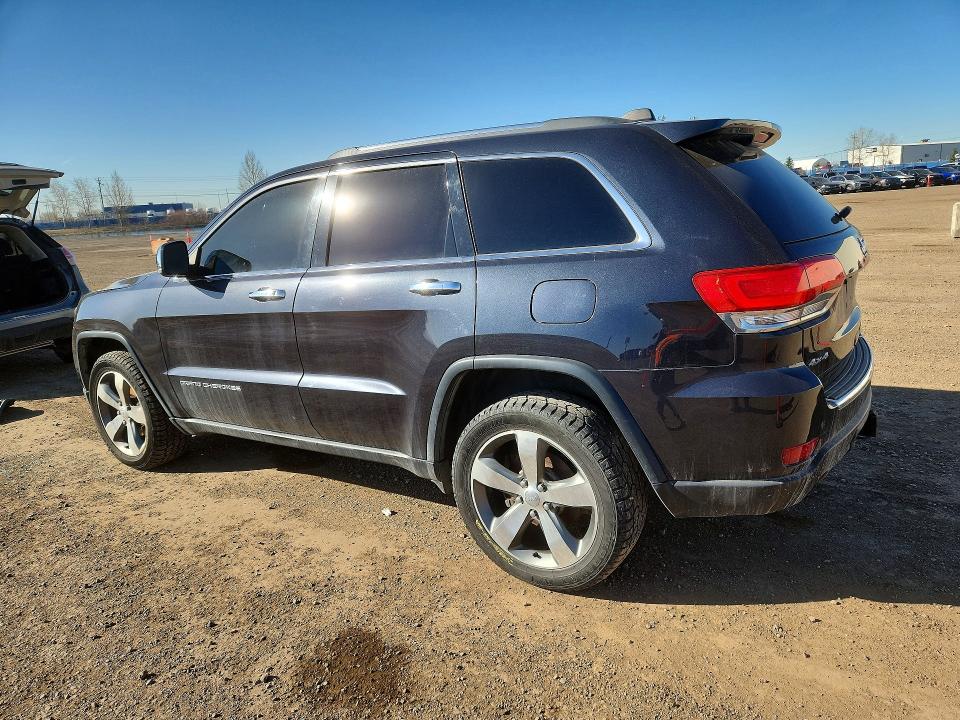2014 Jeep VIN 1C4RJFBG2EC108787 COPART salvage auction — VANDALISM, Salvage Title, sold $3,200 on 2026-07-28 (photo 2)