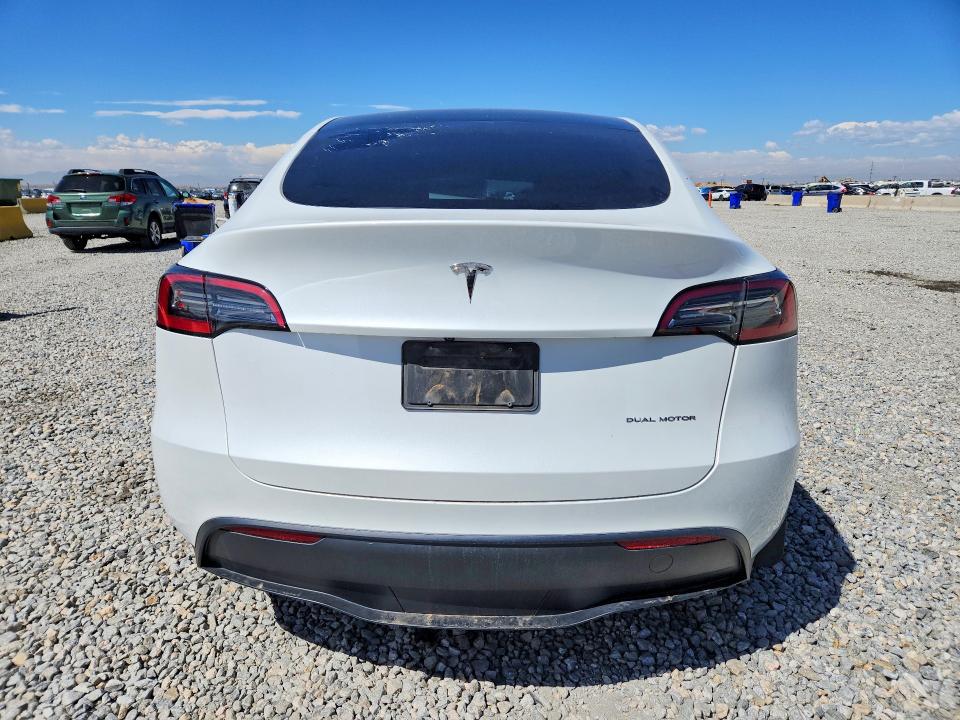 2023 Tesla Model y VIN 7SAYGDEE6PF760359 COPART salvage auction — FRONT END, CO - PUBLIC - SALVAGE TITLE, sold $5,900 on 2026-07-07 (photo 6)