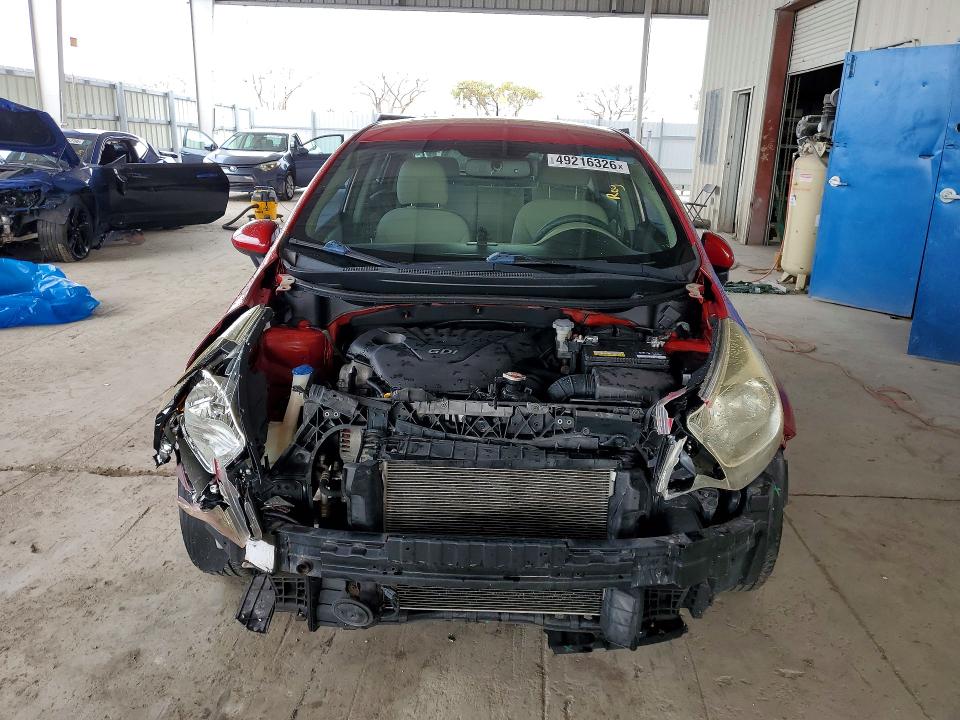 2013 Kia Rio VIN KNADM4A38D6312444 COPART salvage auction — FRONT END, Fl - Cert Of Ttl-Rebuilt&Slvg Rbld, sold $450 on 2026-07-27 (photo 5)