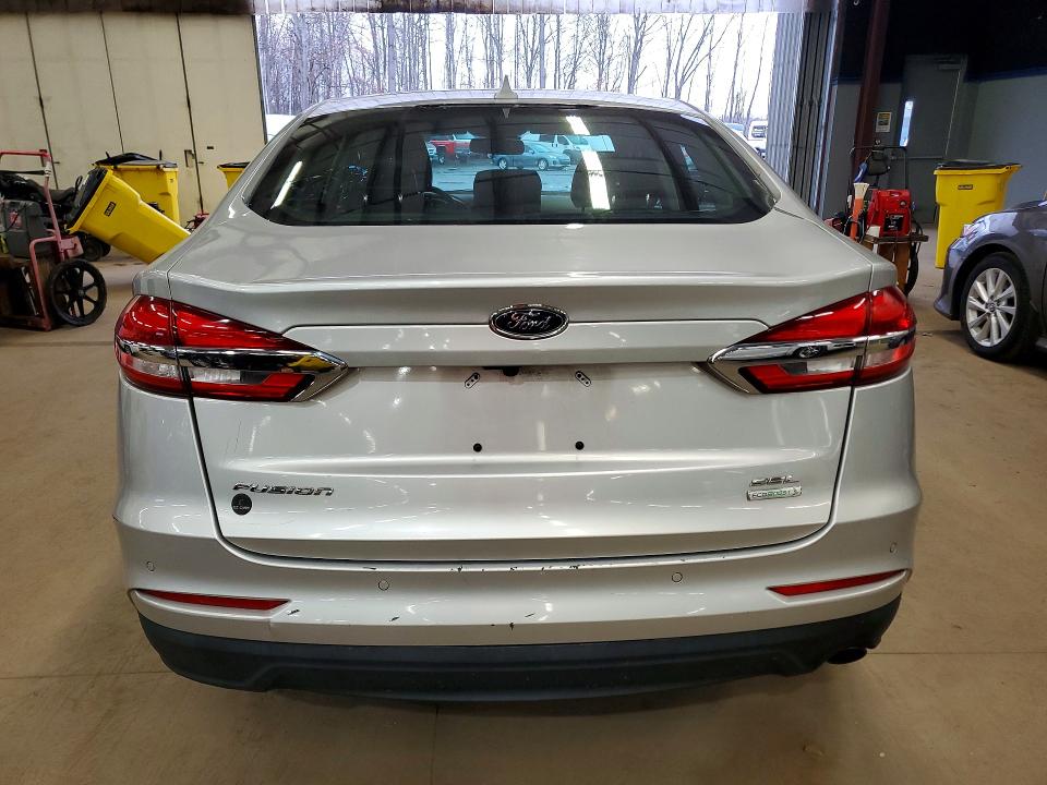 2019 Ford Fusion VIN 3FA6P0CD0KR180464 COPART salvage auction — MINOR DENT/SCRATCHES, MA - CERTIFICATE OF TITLE, sold $1,100 on 2026-07-10 (photo 6)