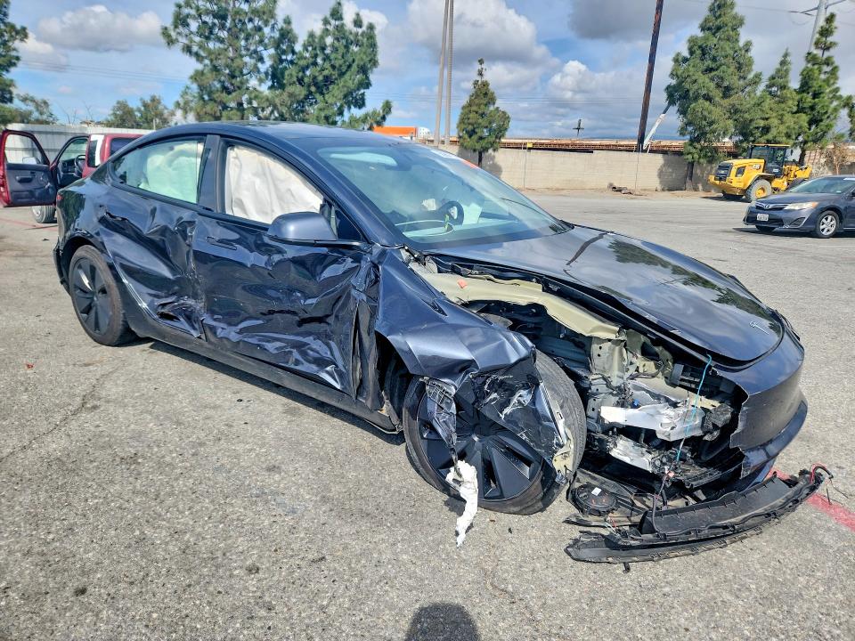 2024 Tesla Model 3 VIN 5YJ3E1EA5RF869231 COPART salvage auction — FRONT END, Ca - Salvage Certificate, sold $7,200 on 2026-07-09 (photo 4)