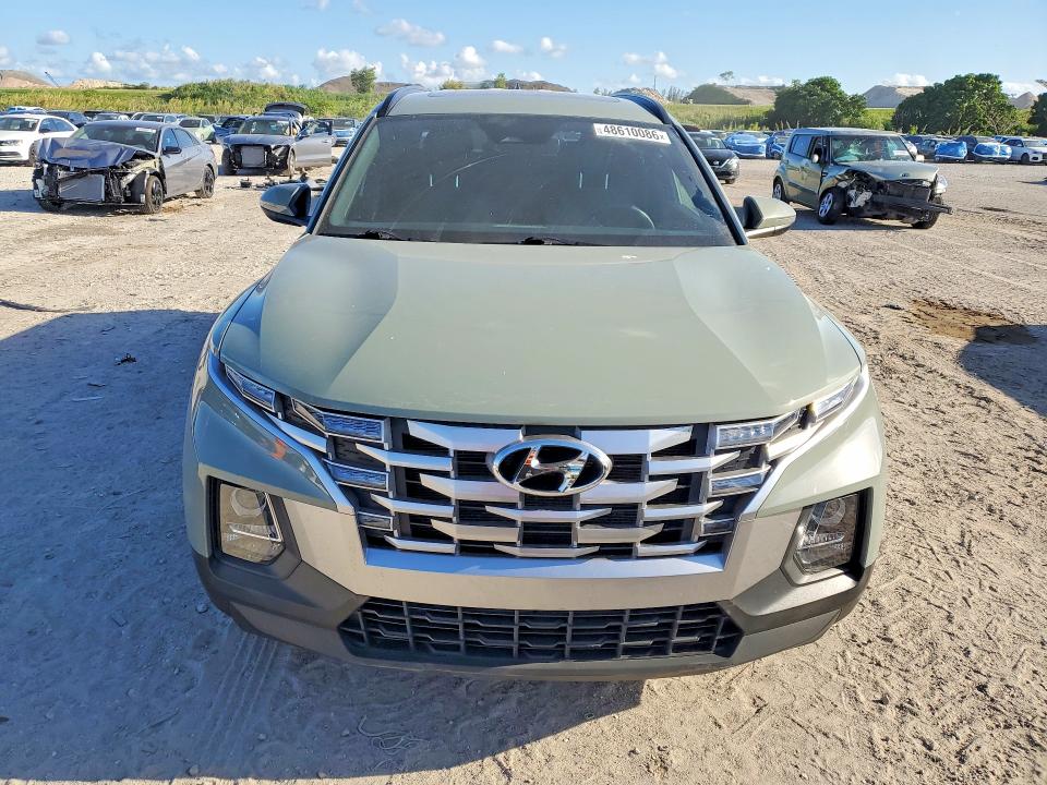 2023 Hyundai Santa cruz VIN 5NTJCDAE8PH040676 COPART salvage auction — SIDE, Fl - Cert Of Title Slvg Rebuildable, sold $9,200 on 2026-07-09 (photo 5)