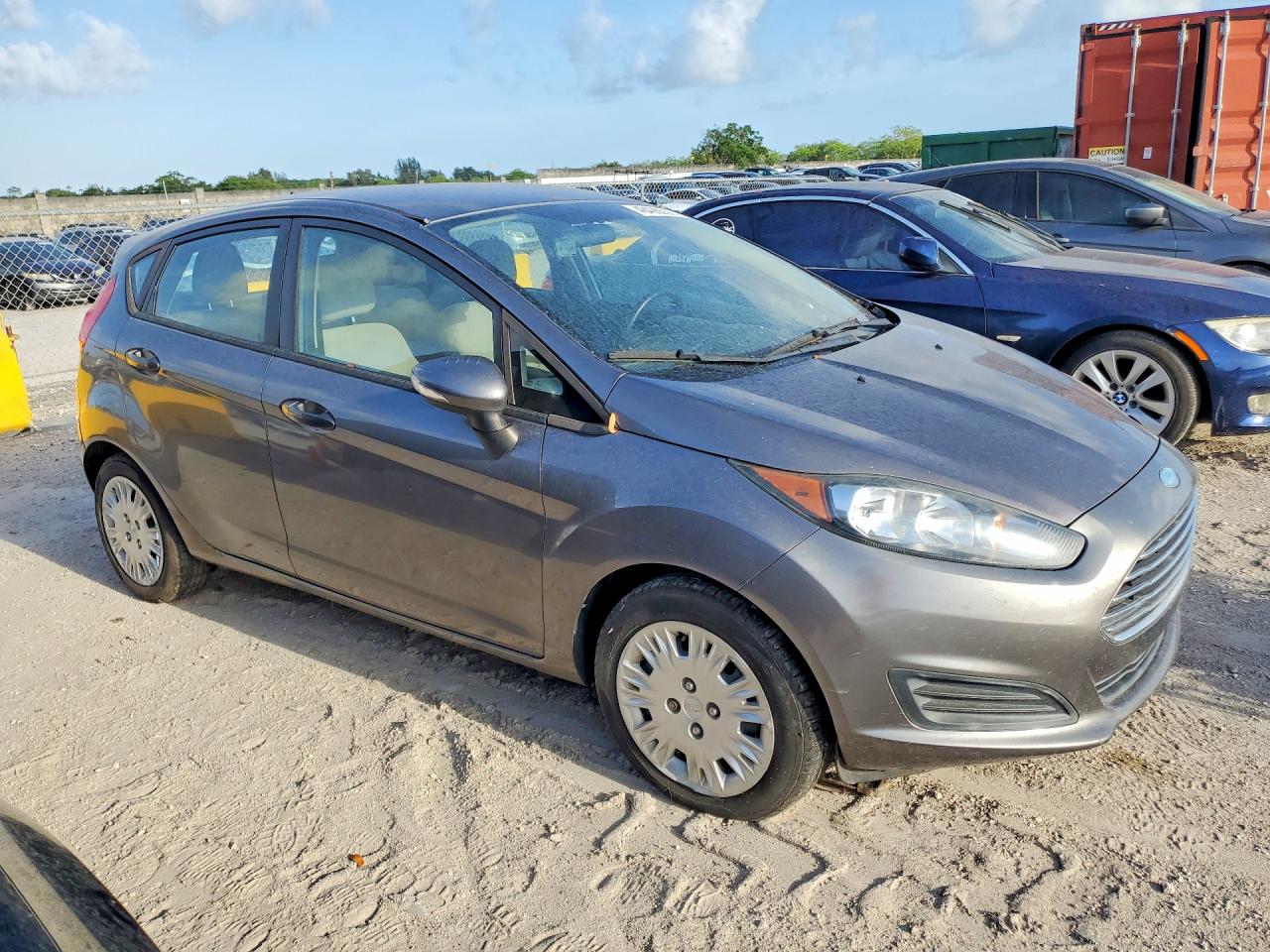 2014 Ford Fiesta VIN 3FADP4EE6EM216034 COPART salvage auction — Minor Dent/Scratches, FL - CERTIFICATE OF TITLE, sold $275 on 2026-07-01 (photo 4)