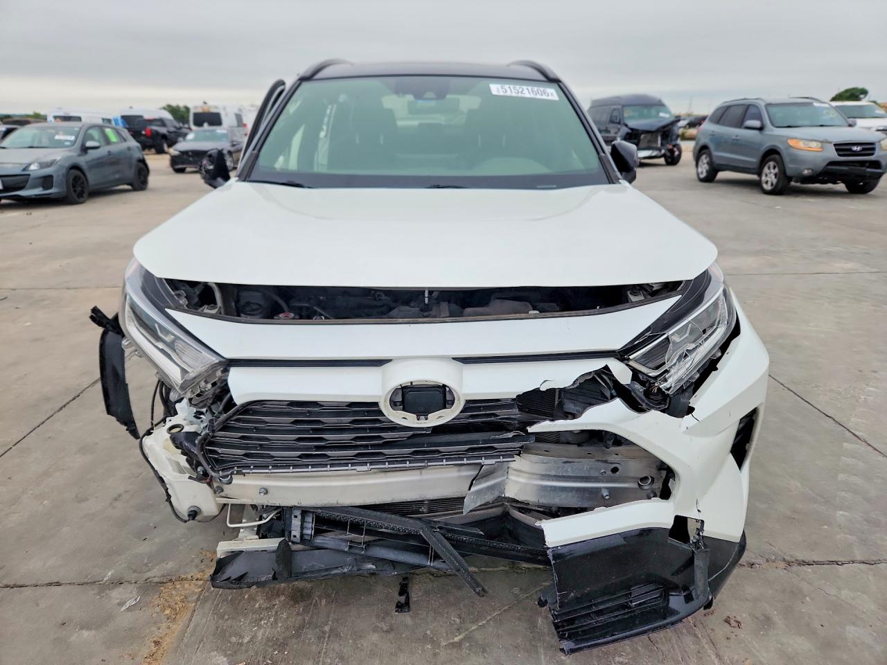 2021 Toyota RAV4 VIN JTME6RFV3MD517884 COPART salvage auction — Side, TX - SALVAGE VEHICLE TITLE, sold $9,800 on 2026-07-02 (photo 5)