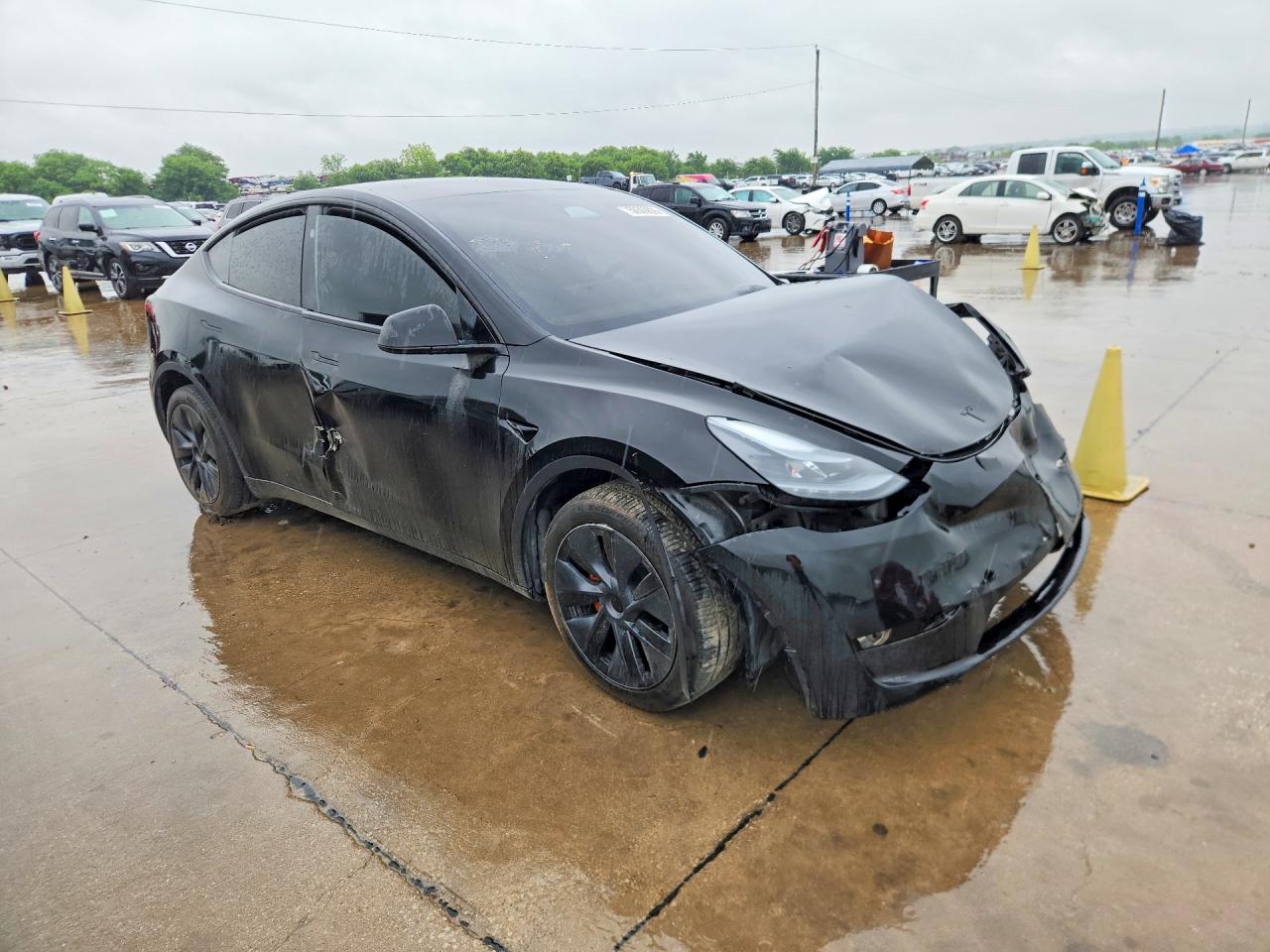 2025 Tesla Model Y VIN 7SAYGDEE9SA344604 COPART salvage auction — Front End, TX - SALVAGE VEHICLE TITLE, sold $9,900 on 2026-07-09 (photo 4)