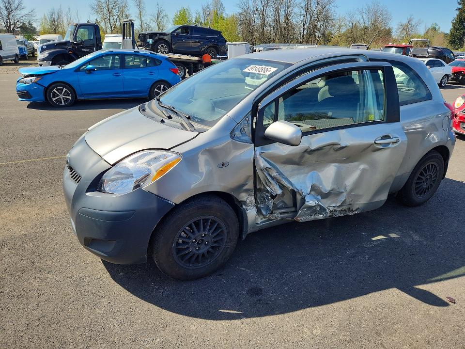 2011 Toyota Yaris VIN JTDJT4K33B5333051 COPART salvage auction — SIDE, Or - Salvage Title Certificate, sold $225 on 2026-07-06 (photo 1)