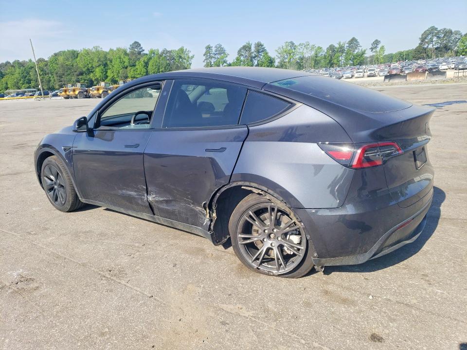 2025 Tesla Model y VIN 7SAYGDED6SA371234 COPART salvage auction — SIDE, Nc - Salvage Certificate Of Title, sold $375 on 2026-07-30 (photo 2)