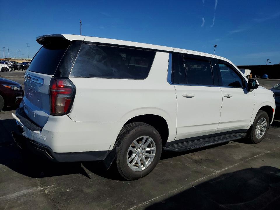 2023 Chevrolet Suburban VIN 1GNSKCKD9PR212395 COPART salvage auction — Rear End, Id - Dis/Dlr/Exp Only Salvage Title, sold $23,400 on 2026-05-22 (photo 3)