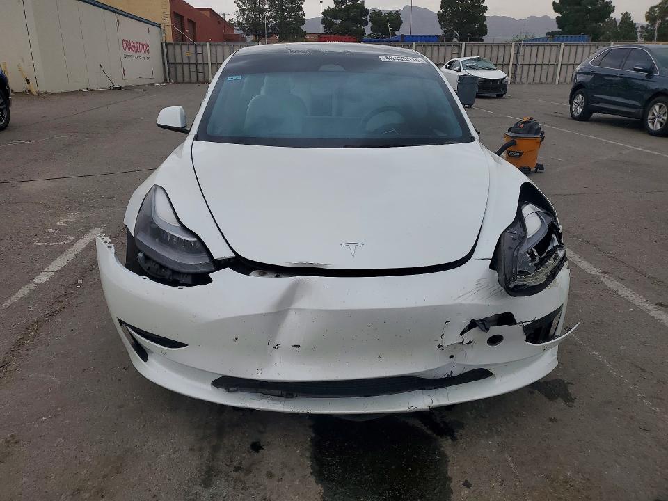 2022 Tesla Model 3 VIN 5YJ3E1EAXNF345101 COPART salvage auction — FRONT END, Tx - Salvage Vehicle Title, sold $175 on 2026-07-31 (photo 5)