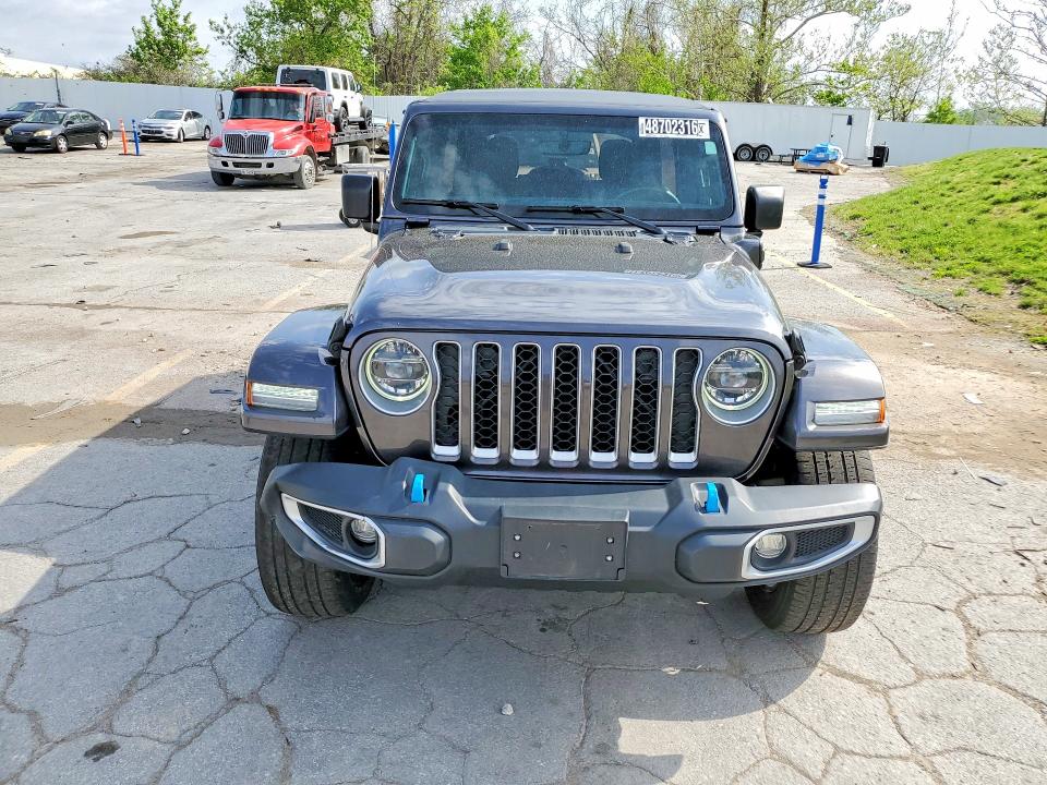2022 Jeep Wrangler unlimited VIN 1C4JJXP6XNW276002 COPART salvage auction — MINOR DENT/SCRATCHES, MO - CERTIFICATE OF TITLE, sold $20,000 on 2026-07-16 (photo 5)