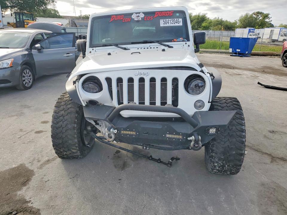 2016 Jeep Wrangler / VIN 1C4BJWDG7GL169506 COPART salvage auction — FRONT END, Fl - Cert Of Title Slvg Rebuildable, sold $3,200 on 2026-07-09 (photo 5)