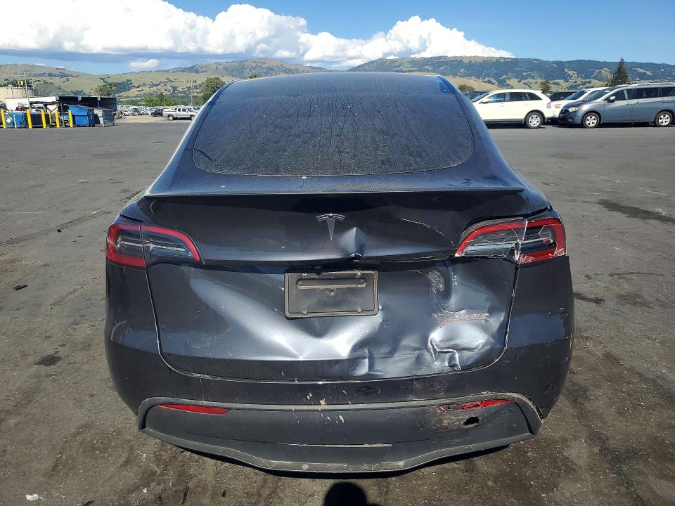 2024 Tesla Model y VIN 7SAYGDEF2RA267898 COPART salvage auction — REAR END, Ca - Salvage Certificate, sold $15,500 on 2026-07-07 (photo 6)