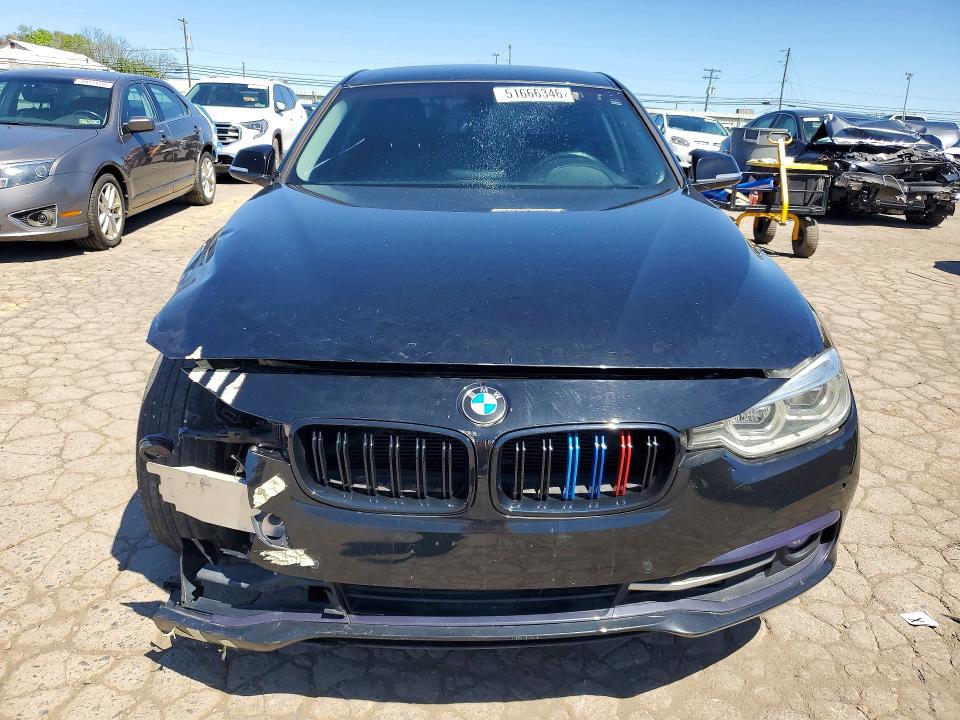 2018 BMW 3 series VIN WBA8A9C50JAC99934 COPART salvage auction — FRONT END, In - Certificate Of Title, sold $1,800 on 2026-07-08 (photo 5)