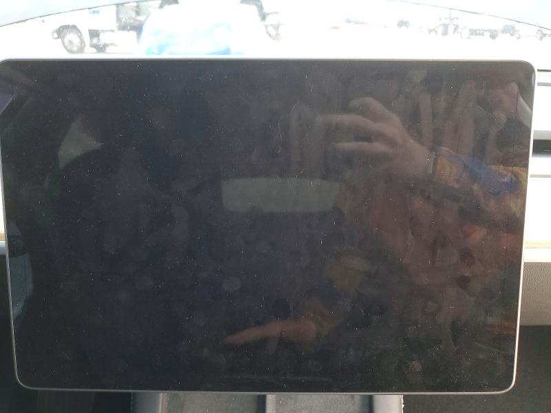 2023 Tesla Model y VIN 7SAYGDEE5PA054822 COPART salvage auction — SIDE, Tx - Salvage Vehicle Title, sold $11,800 on 2026-07-03 (photo 9)