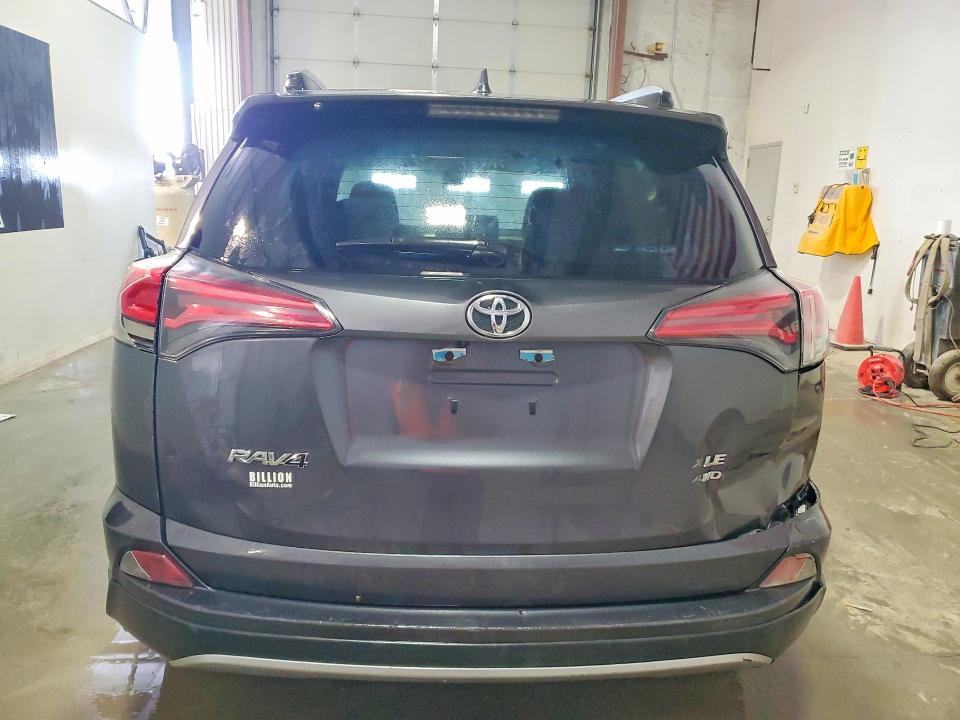 2018 Toyota Rav4 VIN JTMRFREVXJJ241462 COPART salvage auction — REAR END, IN - CERTIFICATE OF TITLE, sold $4,250 on 2026-07-21 (photo 6)
