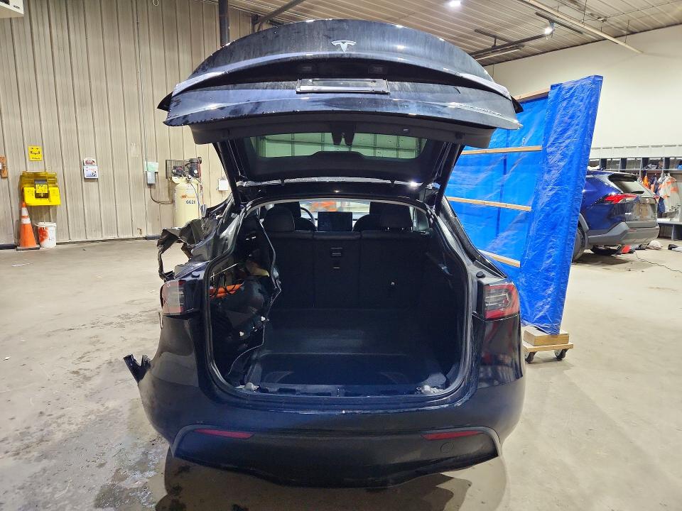 2023 Tesla Model y VIN 7SAYGDEE9PA187003 COPART salvage auction — REAR END, Nh - Cert Of Title-Salvage, sold $10,600 on 2026-07-07 (photo 6)