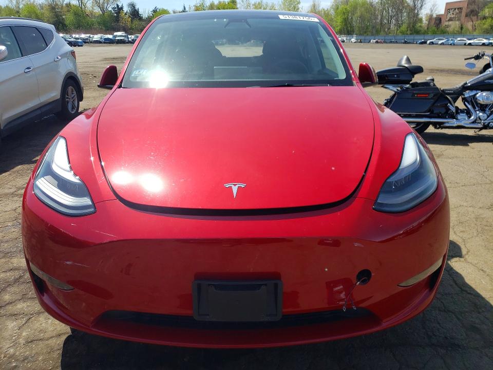 2022 Tesla Model y VIN 7SAYGDEF0NF309773 COPART salvage auction — REAR END, Salvage Title, sold $7,000 on 2026-07-14 (photo 5)