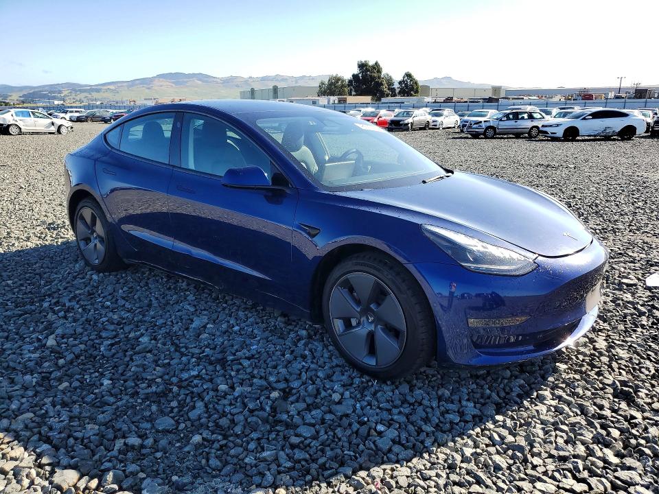2022 Tesla VIN 5YJ3E1EB5NF297919 COPART salvage auction — SIDE, Ca - Salvage Certificate, sold $10,100 on 2026-07-09 (photo 4)