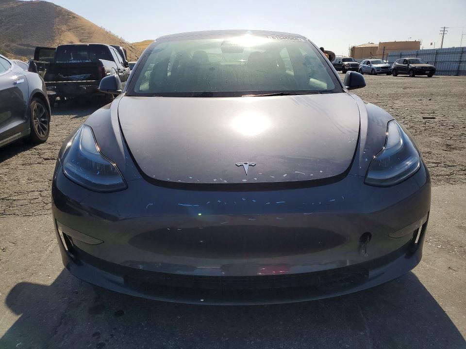 2023 Tesla Model 3 VIN 5YJ3E1EB2PF678193 COPART salvage auction — REAR END, Salvage Title, sold $9,600 on 2026-07-30 (photo 5)