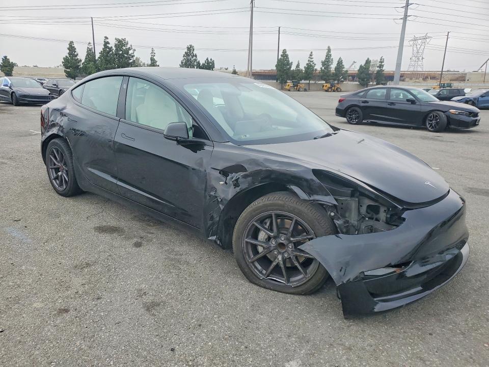 2023 Tesla Model 3 VIN 5YJ3E1EA3PF587702 COPART salvage auction — ALL OVER, Ca - Salvage Certificate, sold $5,000 on 2026-07-30 (photo 4)