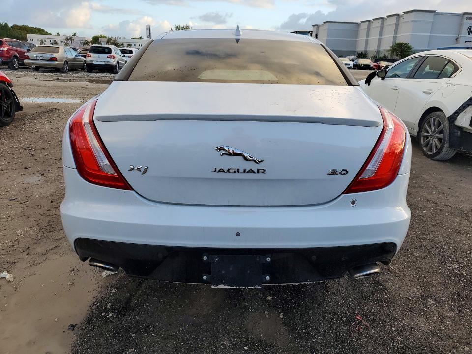 2016 Jaguar Xj VIN SAJWA1C74G8W01849 COPART salvage auction — MINOR DENT/SCRATCHES, Fl - Certificate Of Title, sold $975 on 2026-07-31 (photo 6)