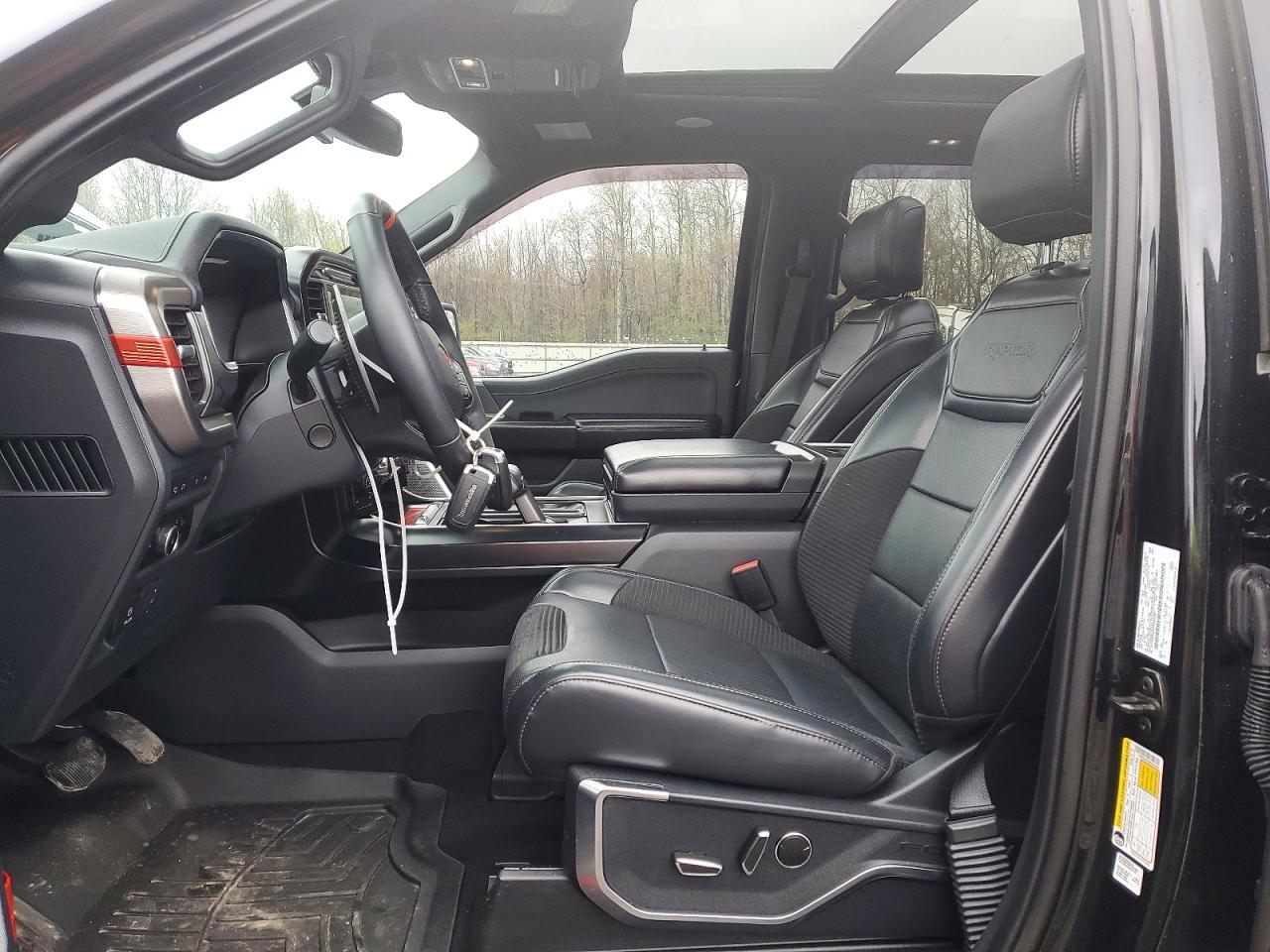 2023 Ford F-150 Lightning VIN 1FTFW1RG0PFB42466 COPART salvage auction — Side, NY - MV-907A SALVAGE CERTIFICATE, sold $48,750 on 2026-07-09 (photo 7)