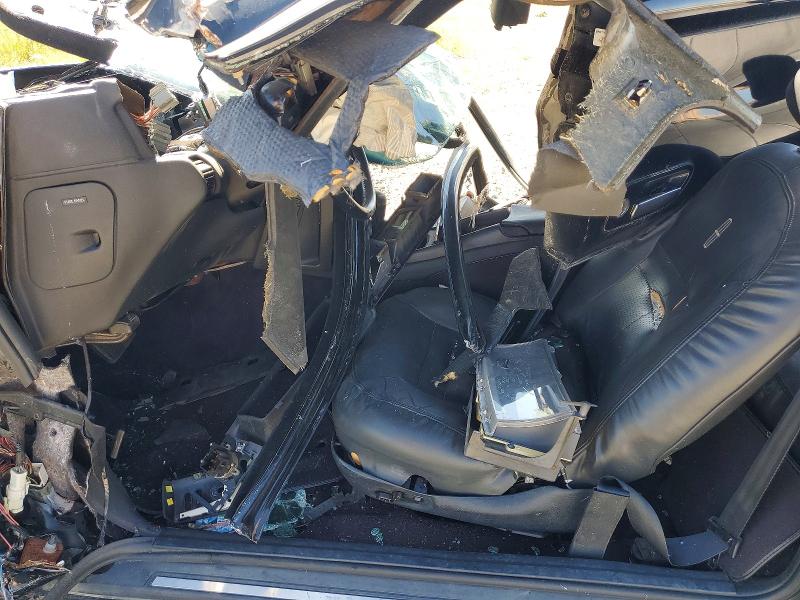 1995 Lincoln Mark series VIN 1LNLM91V4SY760187 COPART salvage auction — ALL OVER, Ca - Dis/Dlr/Exp Lien Papers-Salv, sold $50 on 2026-07-08 (photo 7)