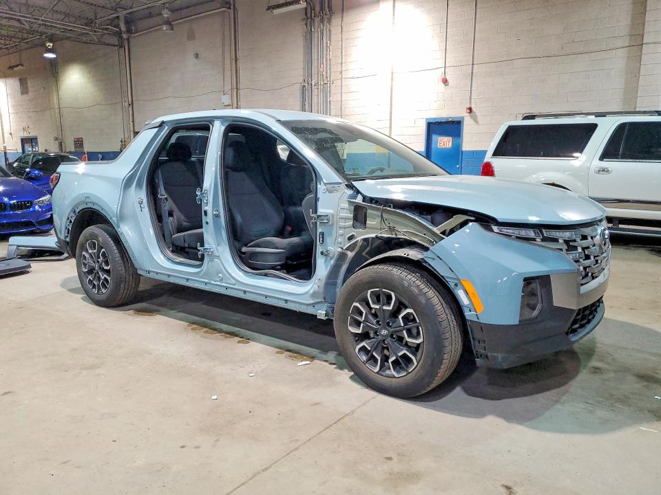 2024 Hyundai Santa cruz VIN 5NTJBDDE1RH111427 COPART salvage auction — SIDE, MI - CERT OF TITLE-SALVAGE VEHICLE, sold $8,600 on 2026-07-10 (photo 4)