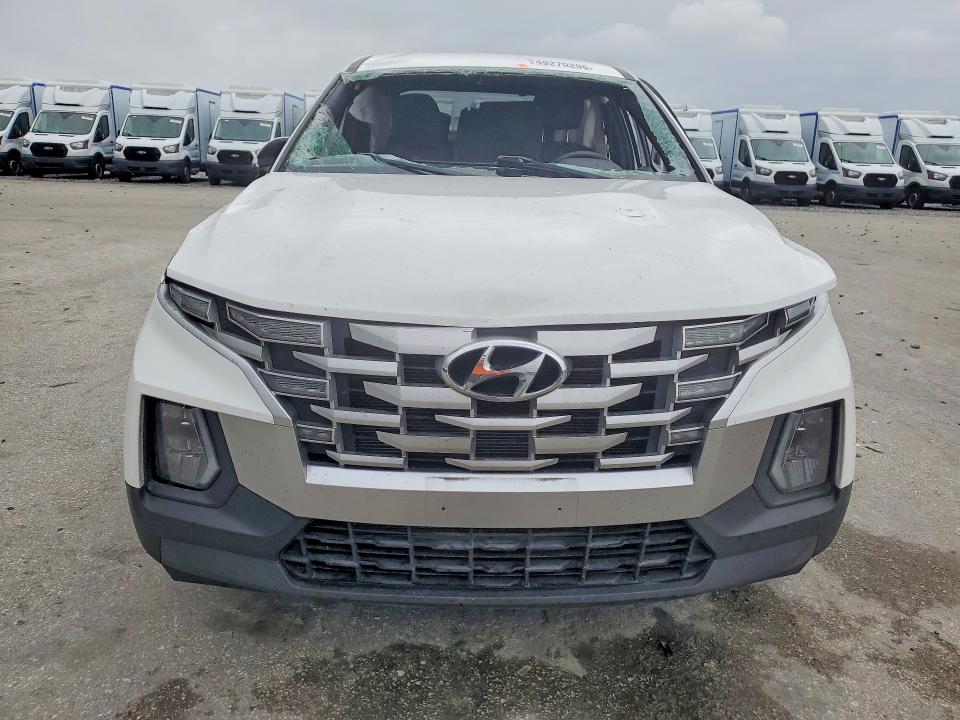 2024 Hyundai Santa cruz VIN 5NTJB4AE3RH088513 COPART salvage auction — SIDE, Fl - Certificate Of Destruction, sold $3,800 on 2026-07-15 (photo 5)