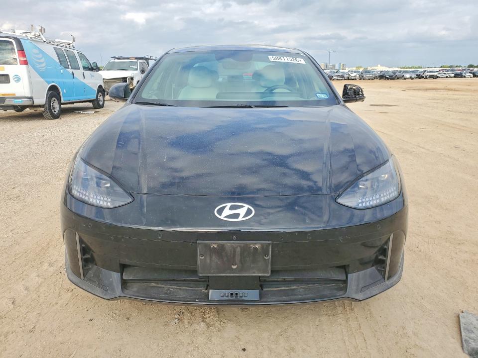 2025 Hyundai Ioniq 6 VIN KMHM54AA2SA095865 COPART salvage auction — SIDE, TX - SALVAGE VEHICLE TITLE, sold $14,500 on 2026-07-30 (photo 5)