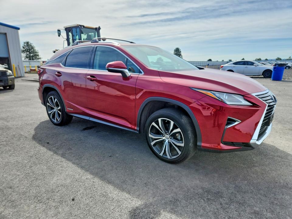 2016 Lexus Rx 450h VIN 2T2BGMCA1GC002884 COPART salvage auction — NORMAL WEAR, FL - CERTIFICATE OF TITLE, sold $2,950 on 2026-07-22 (photo 4)