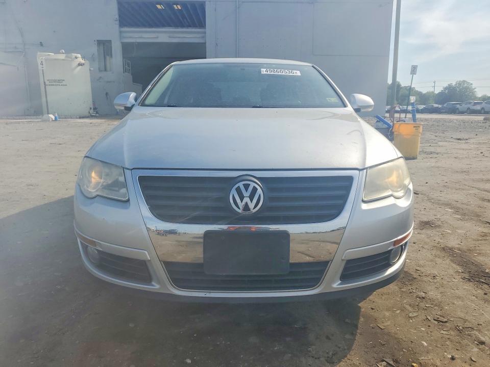 2010 Volkswagen Passat VIN WVWJK7AN5AE139790 COPART salvage auction — MINOR DENT/SCRATCHES, Va - Certificate Of Title, sold $425 on 2026-08-05 (photo 5)