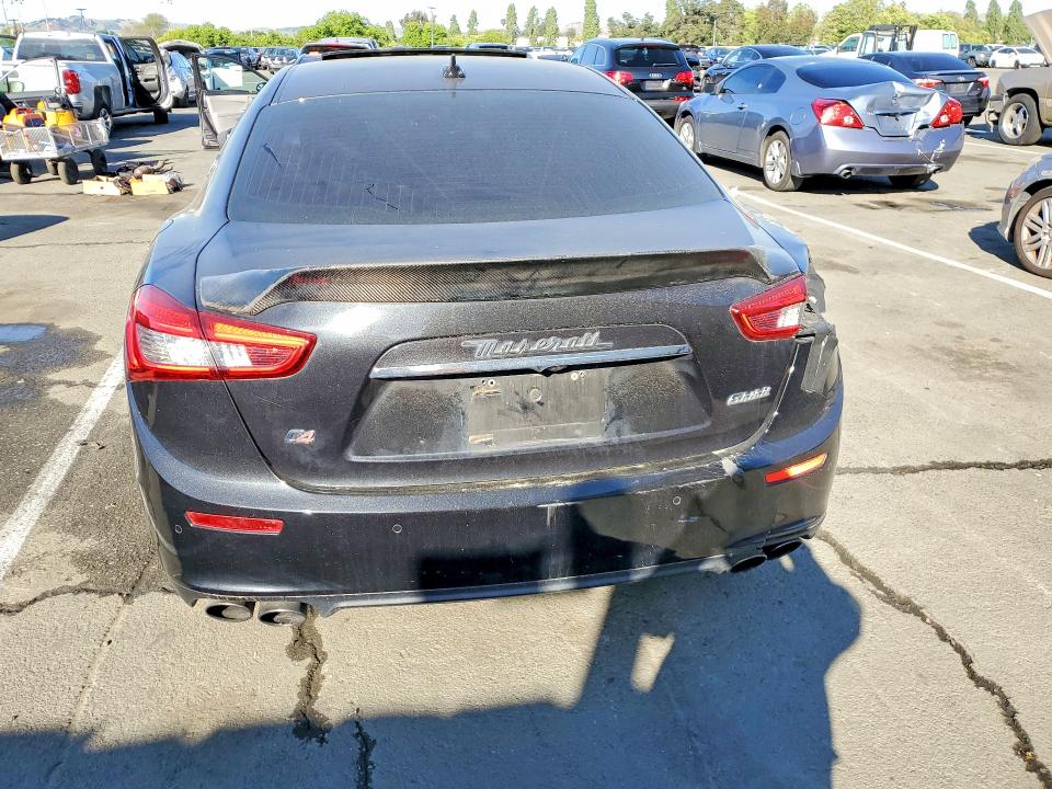 2014 Maserati Ghibli VIN ZAM57RTA9E1085914 COPART salvage auction — SIDE, Fl - Dis/Dlr/Exp Only Clean Title, sold $2,100 on 2026-07-31 (photo 6)