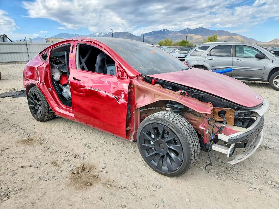 2023 Tesla Model y VIN 7SAYGAEEXPF587475 COPART salvage auction — SIDE, Ut - Salvage Certificate, sold $10,400 on 2026-07-31 (photo 4)