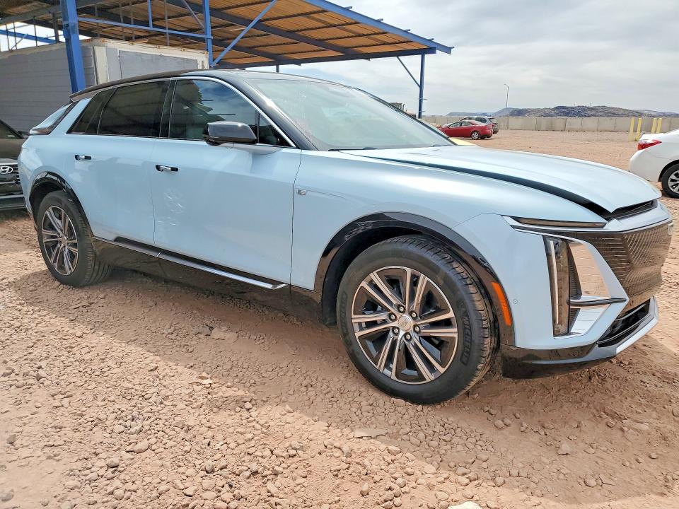 2024 Cadillac Lyriq VIN 1GYKPPRK9RZ141203 COPART salvage auction — UNDERCARRIAGE, Az - Cert Of Title - Salvage, sold $15,200 on 2026-07-07 (photo 4)