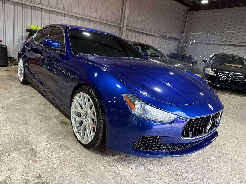 2014 Maserati Ghibli VIN ZAM57RTA0E1087454 COPART salvage auction — DAMAGE HISTORY, Co - Salvage Title (P), sold $18,400 on 2026-07-24 (photo 1)
