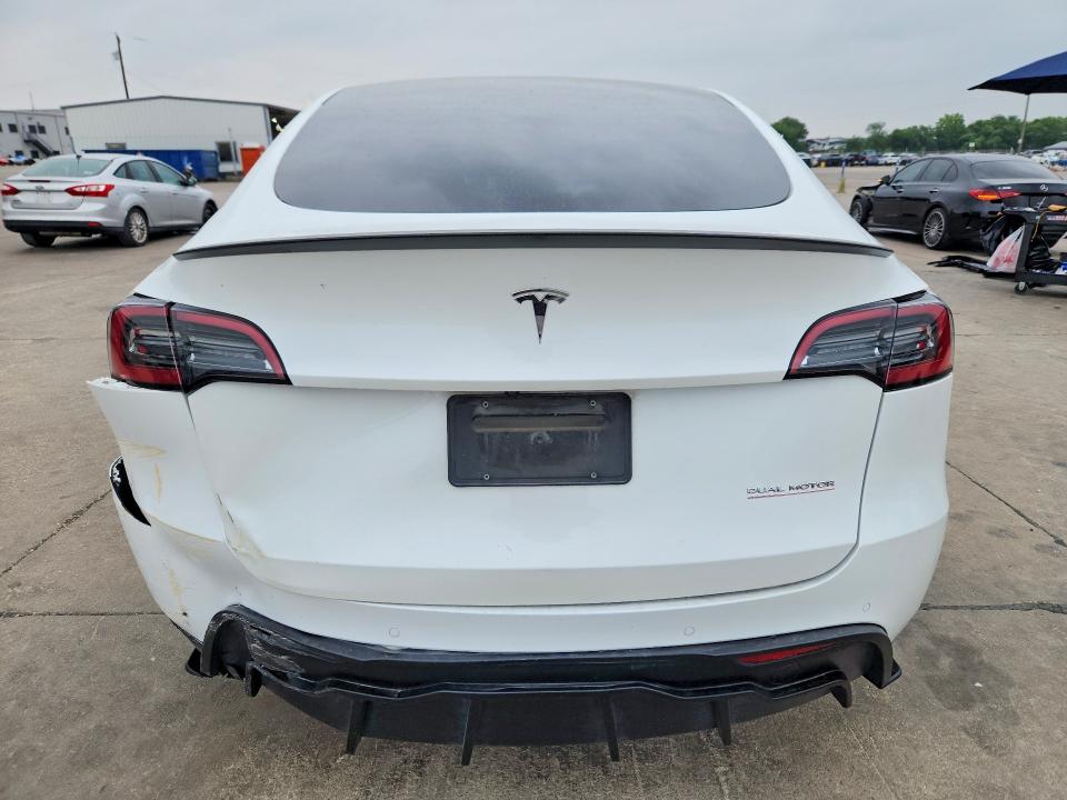 2022 Tesla Model y VIN 7SAYGDEF0NF452268 COPART salvage auction — FRONT END, Tx - Certificate Of Title, sold $6,900 on 2026-07-09 (photo 6)