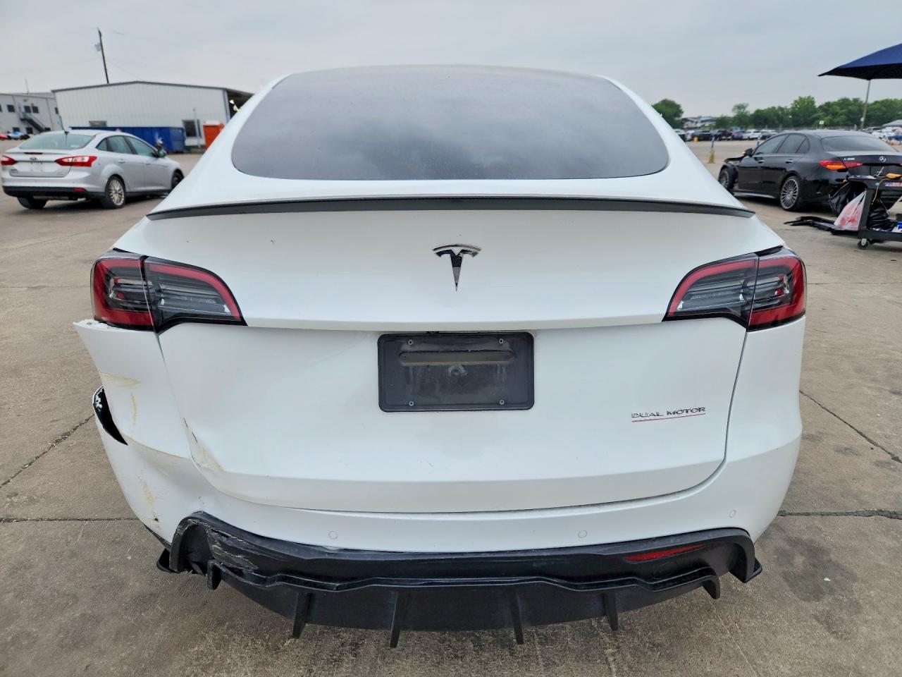 2022 Tesla Model Y VIN 7SAYGDEF0NF452268 COPART salvage auction — Front End, TX - CERTIFICATE OF TITLE, sold $6,900 on 2026-07-09 (photo 6)