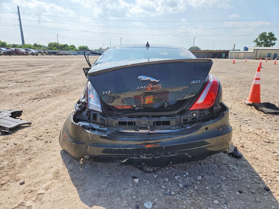 2017 Jaguar Xj series VIN SAJWA1C75H8W10478 COPART salvage auction — ALL OVER, Tx - Salvage Vehicle Title, sold $950 on 2026-07-08 (photo 6)