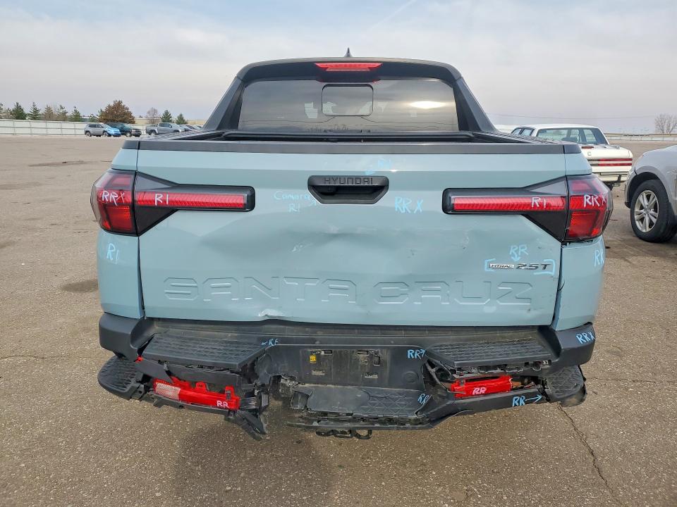 2022 Hyundai Santa cruz VIN 5NTJDDAF3NH015123 COPART salvage auction — REAR END, MN - CERT OF TITLE-SALVAGE, sold $9,800 on 2026-07-07 (photo 6)