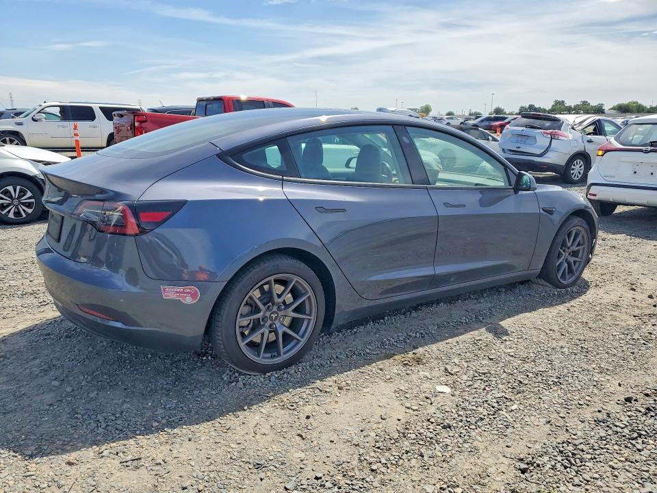 2023 Tesla Model 3 VIN 5YJ3E1EA9PF590524 COPART salvage auction — SIDE, Ca - Salvage Certificate, sold $8,700 on 2026-09-01 (photo 3)