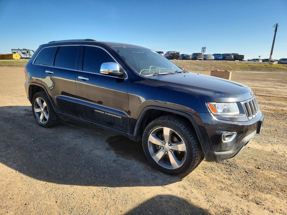 2014 Jeep VIN 1C4RJFBG2EC108787 COPART salvage auction — VANDALISM, Salvage Title, sold $3,200 on 2026-07-28 (photo 4)