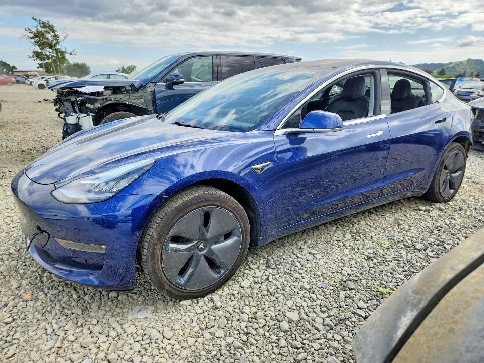 2018 Tesla Model 3 VIN 5YJ3E1EA9JF003021 COPART salvage auction — REAR END, Ca - Salvage Certificate, sold $4,550 on 2026-07-09 (photo 1)