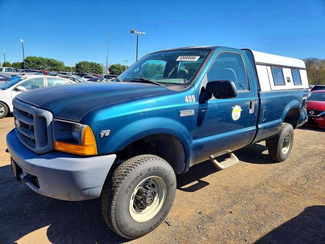 1999 Ford F-250 super duty VIN 1FTNF21L8XED31799 — COPART salvage auction photo
