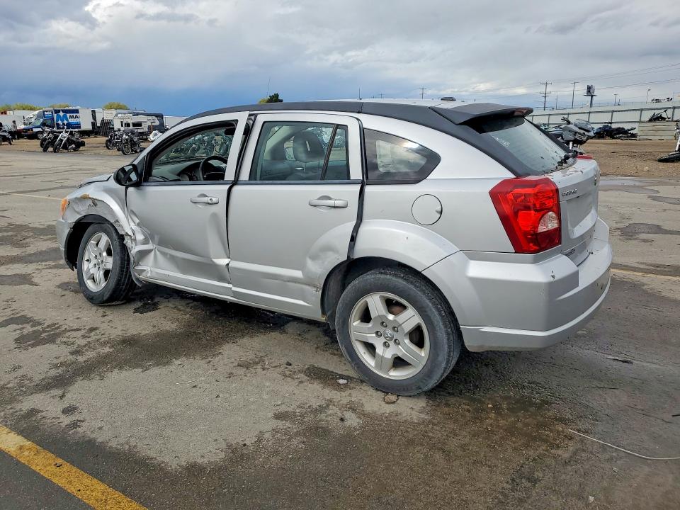 2009 Dodge Caliber VIN 1B3HB48CX9D103274 COPART salvage auction — SIDE, Id - Salvage Certificate Of Title, sold $125 on 2026-07-09 (photo 2)