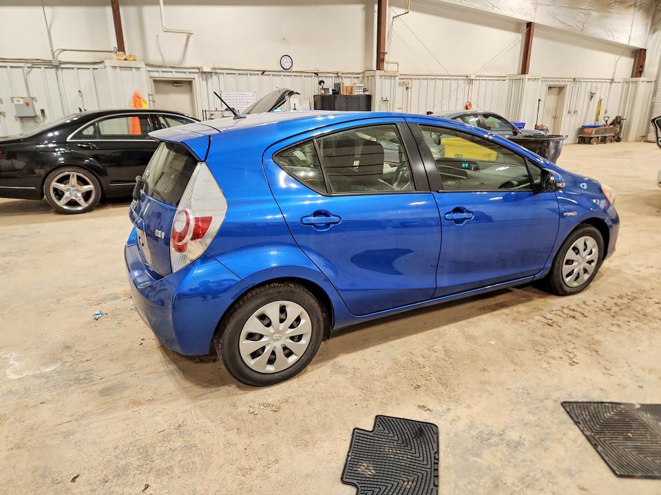2012 Toyota Prius c VIN JTDKDTB31C1515352 COPART salvage auction — SIDE, Wi - Junked Vehicle Bill Of Sale, sold $650 on 2026-07-08 (photo 3)