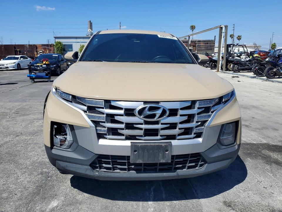 2023 Hyundai Santa cruz VIN 5NTJA4AE5PH048885 COPART salvage auction — SIDE, Salvage Title, sold $6,400 on 2026-07-15 (photo 5)