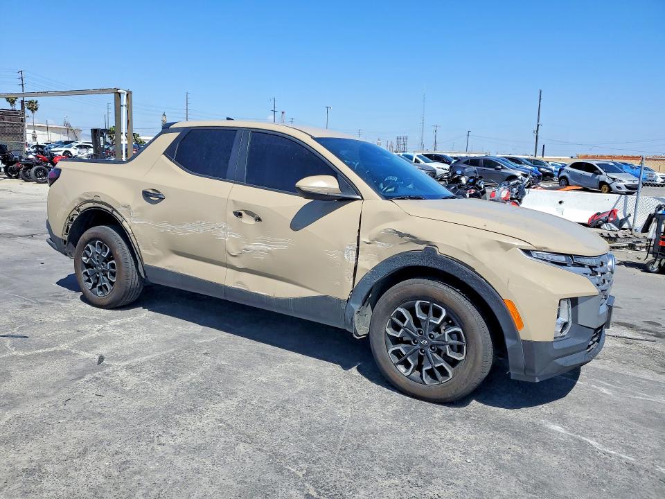 2023 Hyundai Santa cruz VIN 5NTJA4AE5PH048885 COPART salvage auction — SIDE, Salvage Title, sold $6,400 on 2026-07-15 (photo 4)