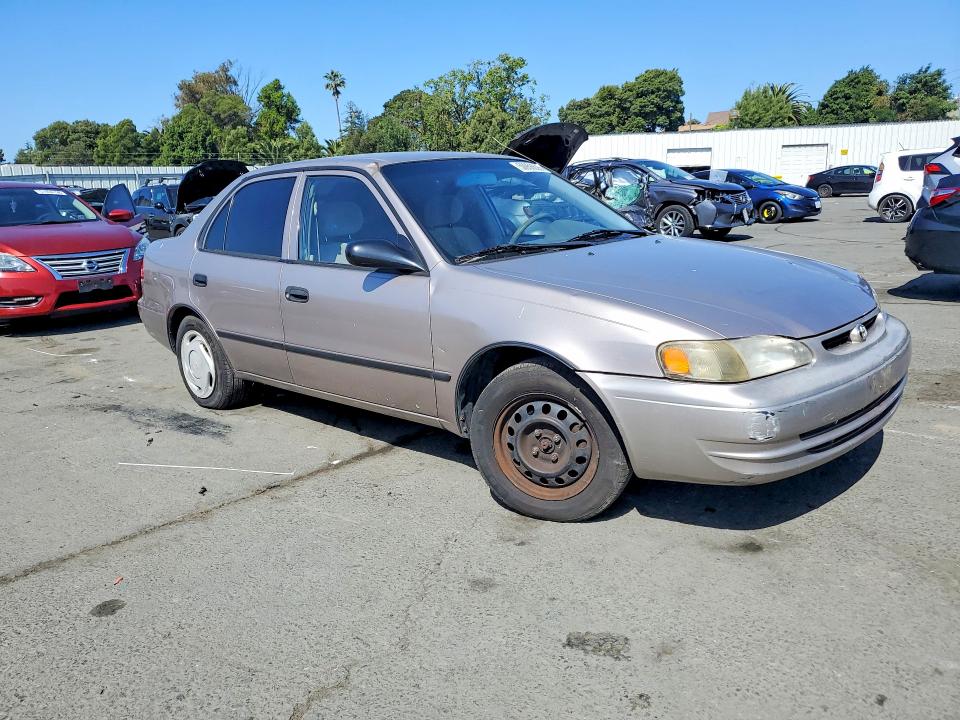 1999 Toyota Corolla VIN 1NXBR12E1XZ221974 COPART salvage auction — MINOR DENT/SCRATCHES, Ca - Dis/Dlr/Exp Only Clean Title, sold $325 on 2026-07-10 (photo 4)