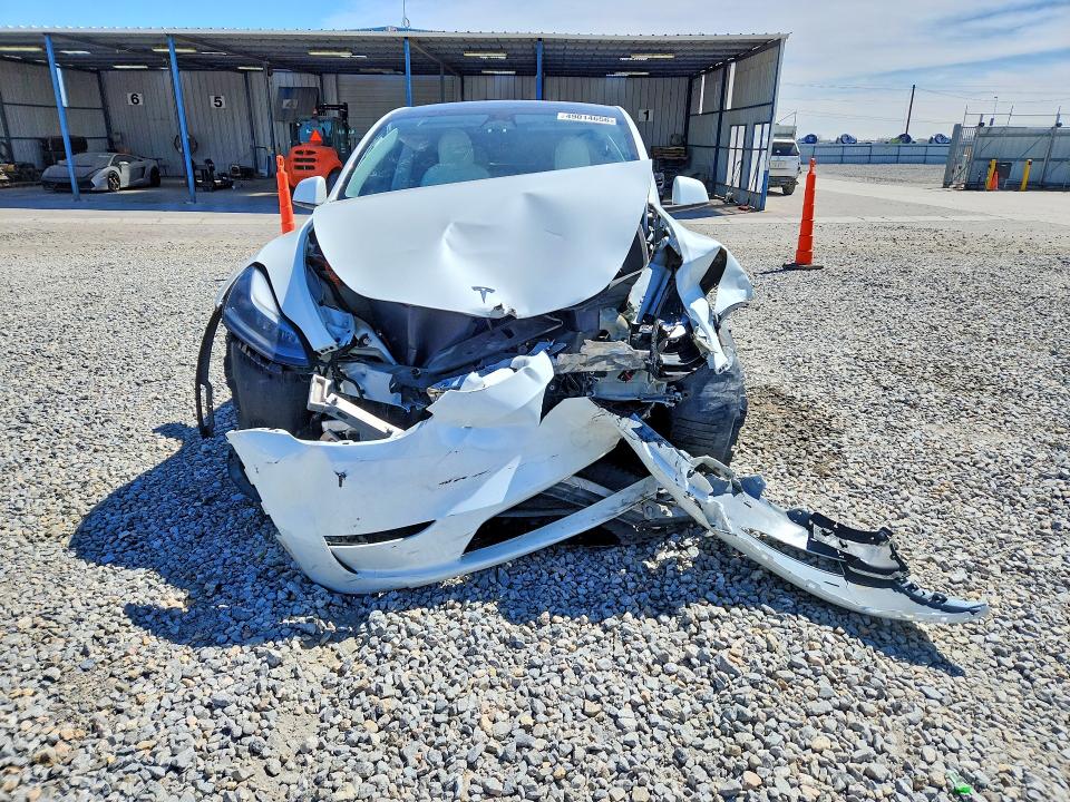 2023 Tesla Model y VIN 7SAYGDEE6PF760359 COPART salvage auction — FRONT END, CO - PUBLIC - SALVAGE TITLE, sold $5,900 on 2026-07-07 (photo 5)